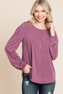Solid black Spandex long sleeve top from Dress4less.com, form-fitting design with a crew neckline and smooth fabric.